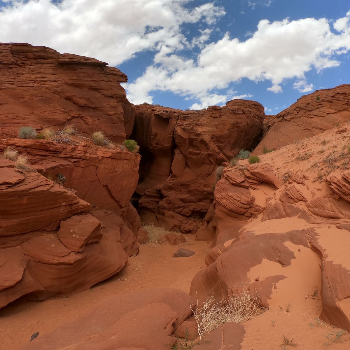a canyon with a mountain in the desert